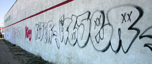 A graffiti-covered wall