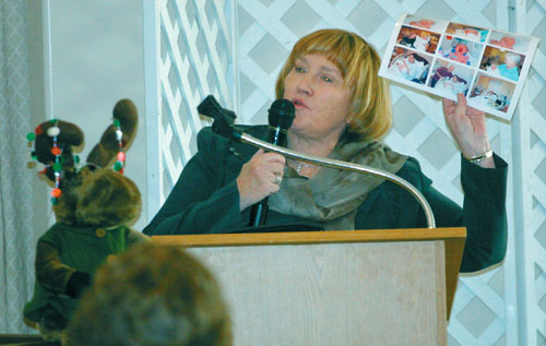 Shear Associates owner Becky Otwell, a candidate for the Hesperia Chamber of Commerce Board of Directors, shows photos of her 14th grandchild during last week's event at Hesperia Senior Campus. Shear Associates owner Becky Otwell, a candidate for the Hesperia Chamber of Commerce Board of Directors, shows photos of her 14th grandchild during last week's event at Hesperia Senior Campus.