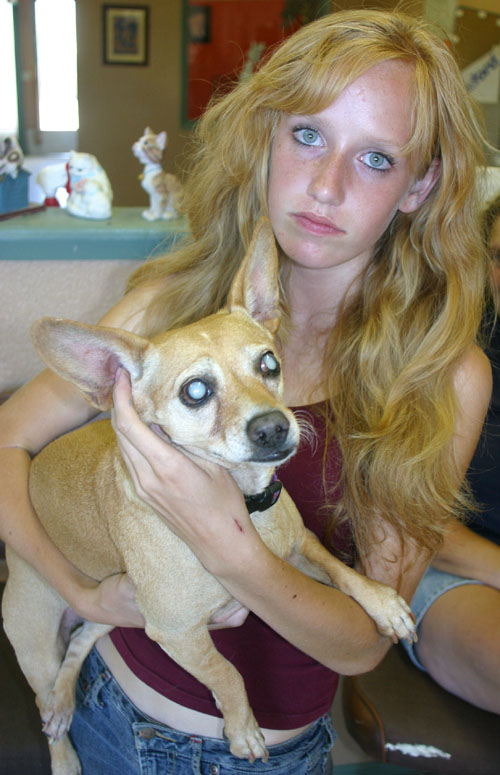 Girl with blind dog